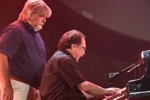 People’s Artist of Russia, pianist Daniil Kramer, right, and professor, pianist and composer Valery Grokhovsky perform at the opening of Koktebel Jazz Party 2021 international jazz festival in Crimea