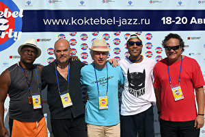 Brazil All Stars band members Edson Da Silva and Anders Bergevantz, from left, and Erivelton Silva and Sergio Brandao, from right, and musician Andrei Kondakov, center, after a news conference at Koktebel Jazz Party 2017 festival